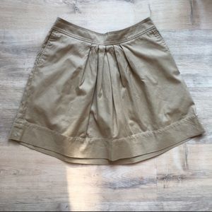 Pleated khaki skirt with pockets